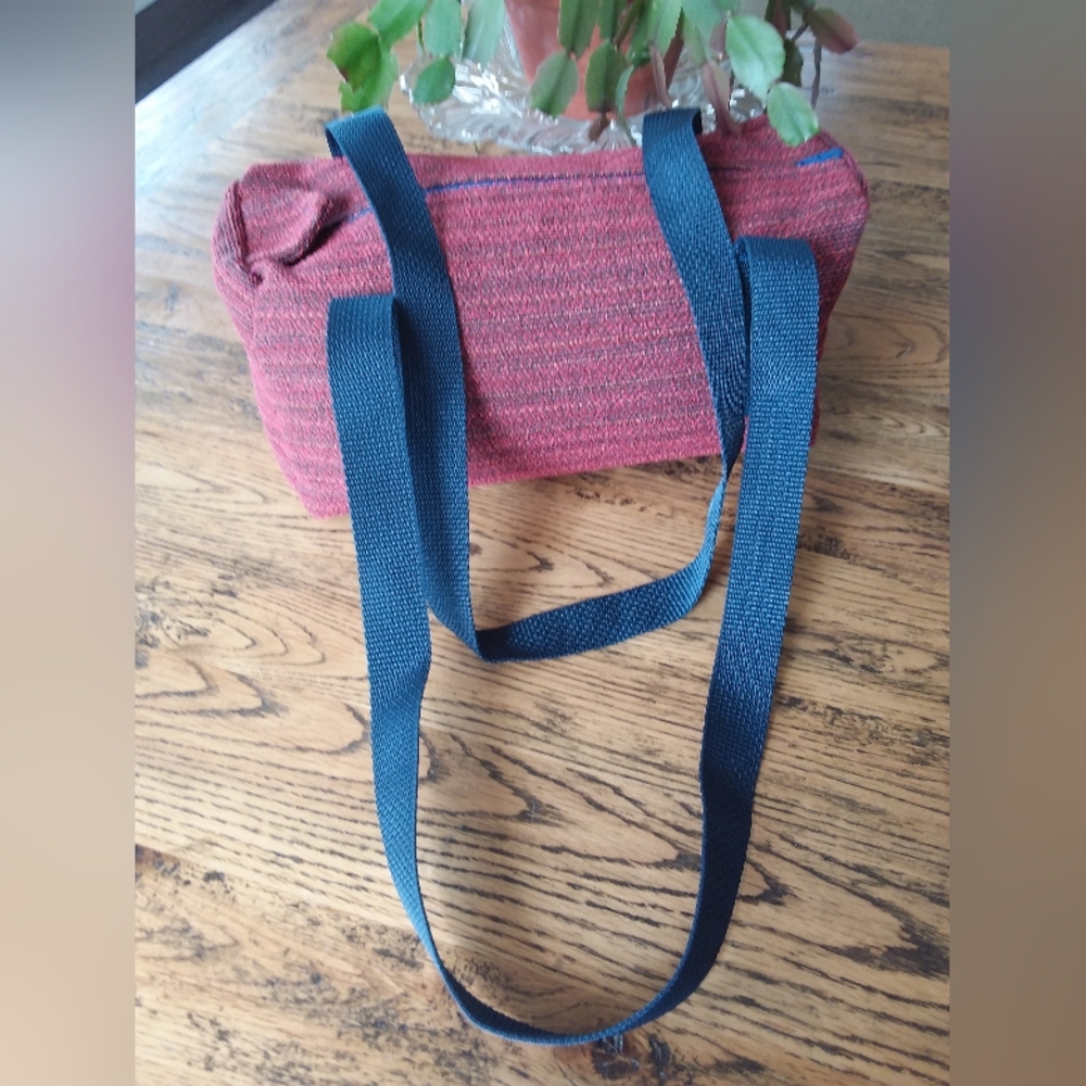 Handmade small duffle bag in muted colors of red/grey/blue